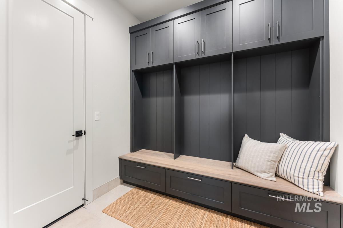 68 Ponderosa Ridge Donnelly, ID 83615 - Photo 12 of 29 Mudroom with light tile patterned flooring