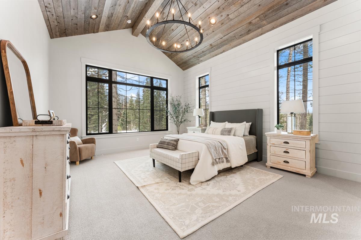 68 Ponderosa Ridge Donnelly, ID 83615 - Photo 3 of 29 Bedroom featuring carpet floors and a chandelier