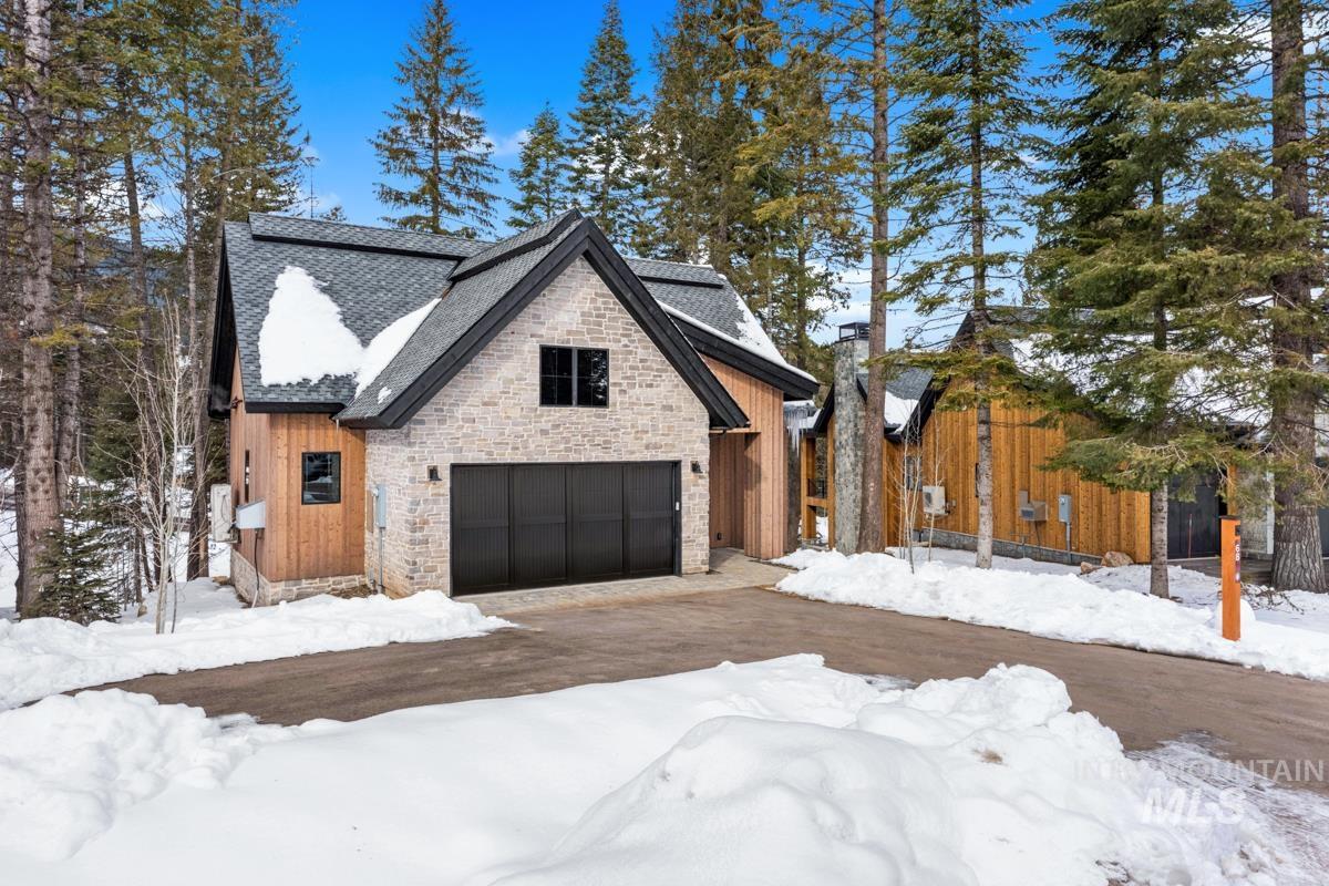 68 Ponderosa Ridge Donnelly, ID 83615 - Photo 6 of 29 View of front facade with stone siding and board and batten siding