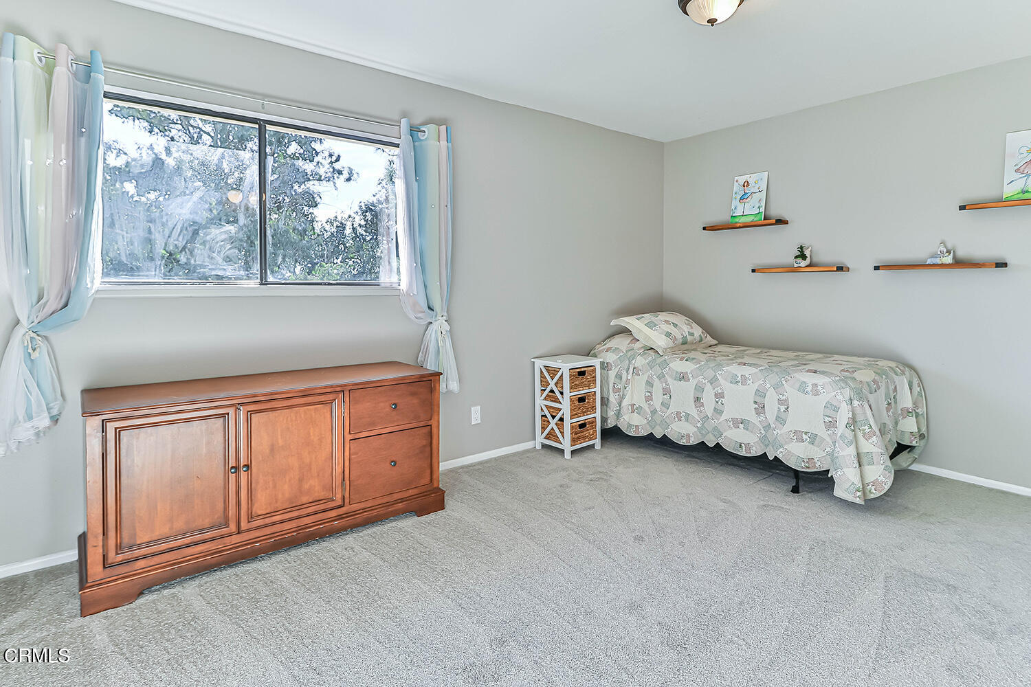 4030 Donlon Road Somis, CA 93066 - Photo 27 of 48 a spacious bedroom with a bed and a cabinets