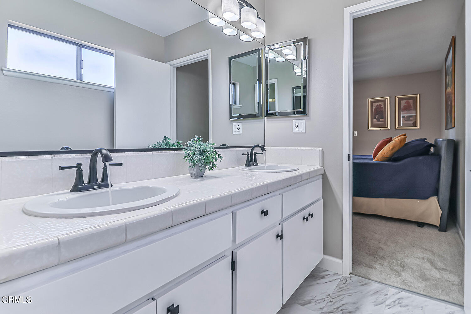 4030 Donlon Road Somis, CA 93066 - Photo 31 of 48 a bathroom with a double vanity sink and a mirror