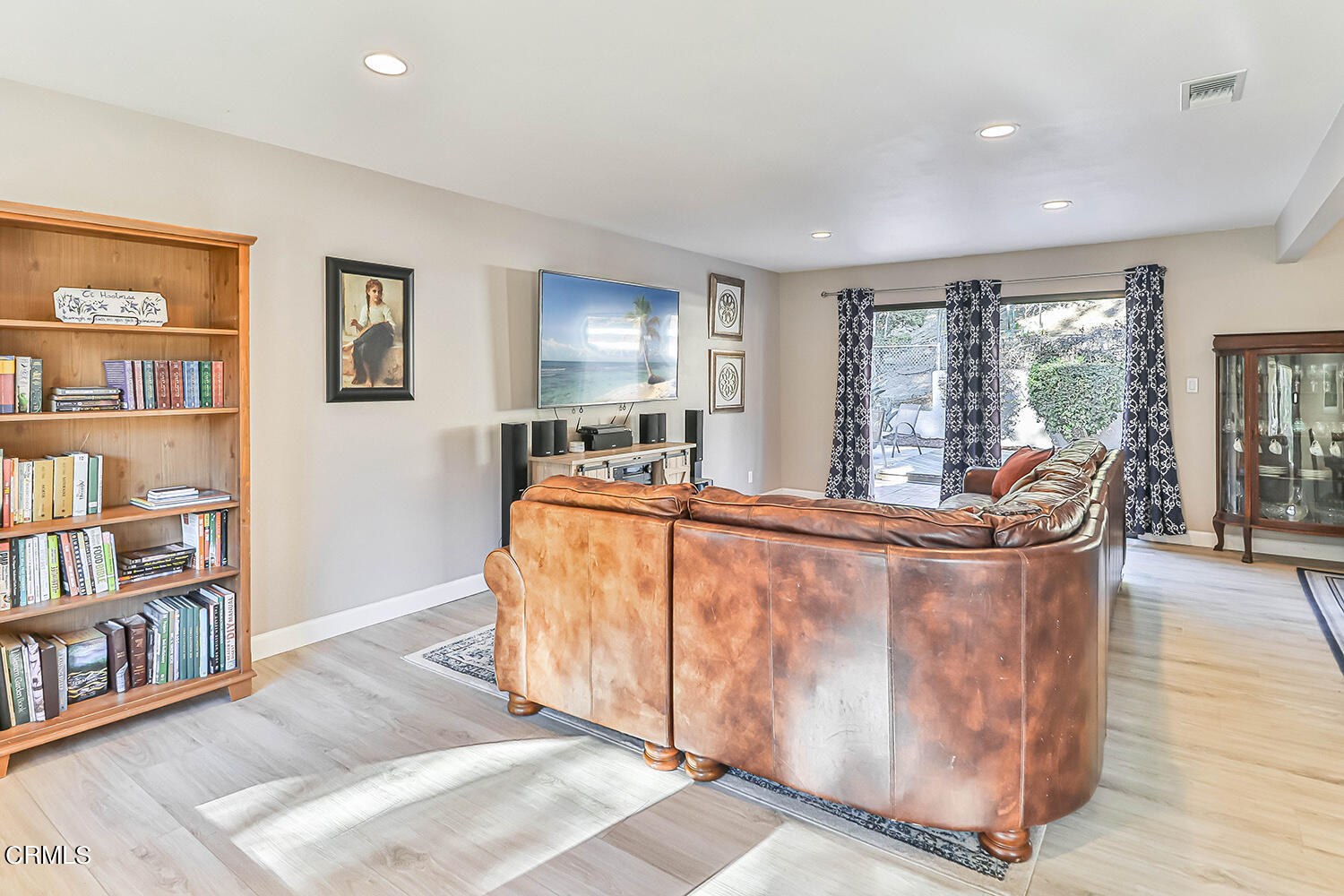 4030 Donlon Road Somis, CA 93066 - Photo 8 of 48 a living room with furniture and a book shelf