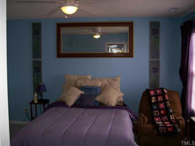 3404 Sosa Road Raleigh, NC 27610 - Photo 6 of 10 Spacious masterbedroom that has a walk in closet and a luxurious bath..oversized shower Other