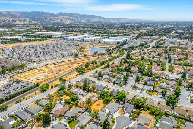 an aerial view of a city with lots of residential buildings