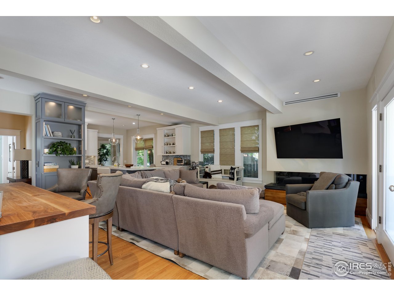421 Highland Avenue Boulder, CO 80302 - Photo 20 of 39 a living room with furniture and a flat screen tv