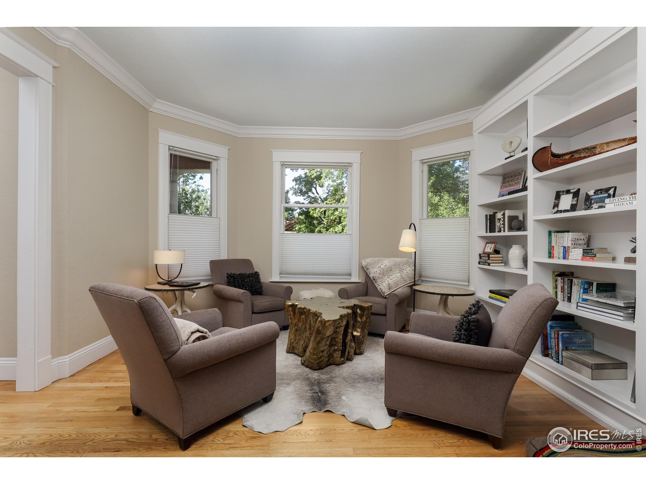 421 Highland Avenue Boulder, CO 80302 - Photo 21 of 39 a living room with furniture and a book shelf