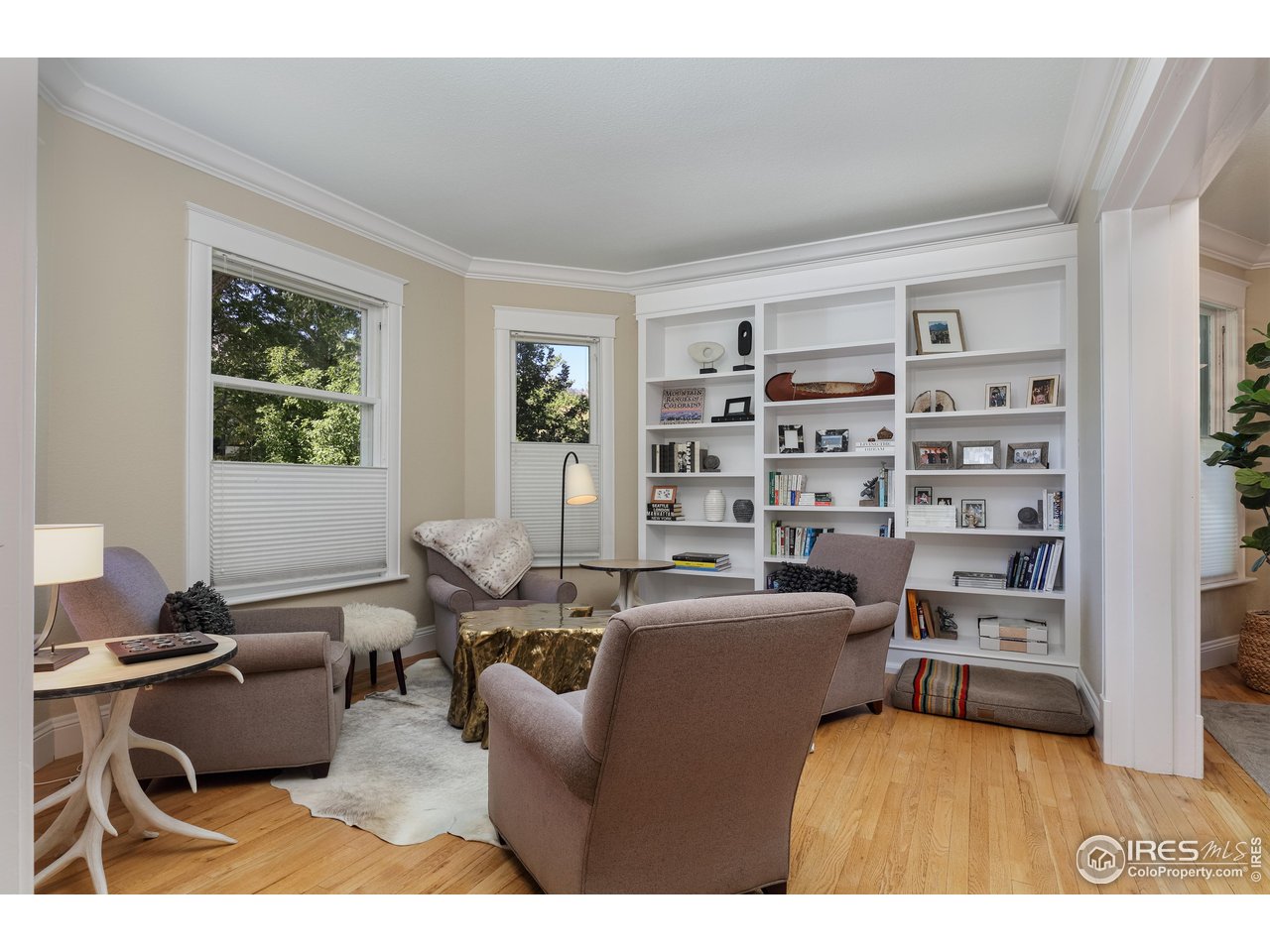 421 Highland Avenue Boulder, CO 80302 - Photo 22 of 39 a living room with furniture a rug and a window