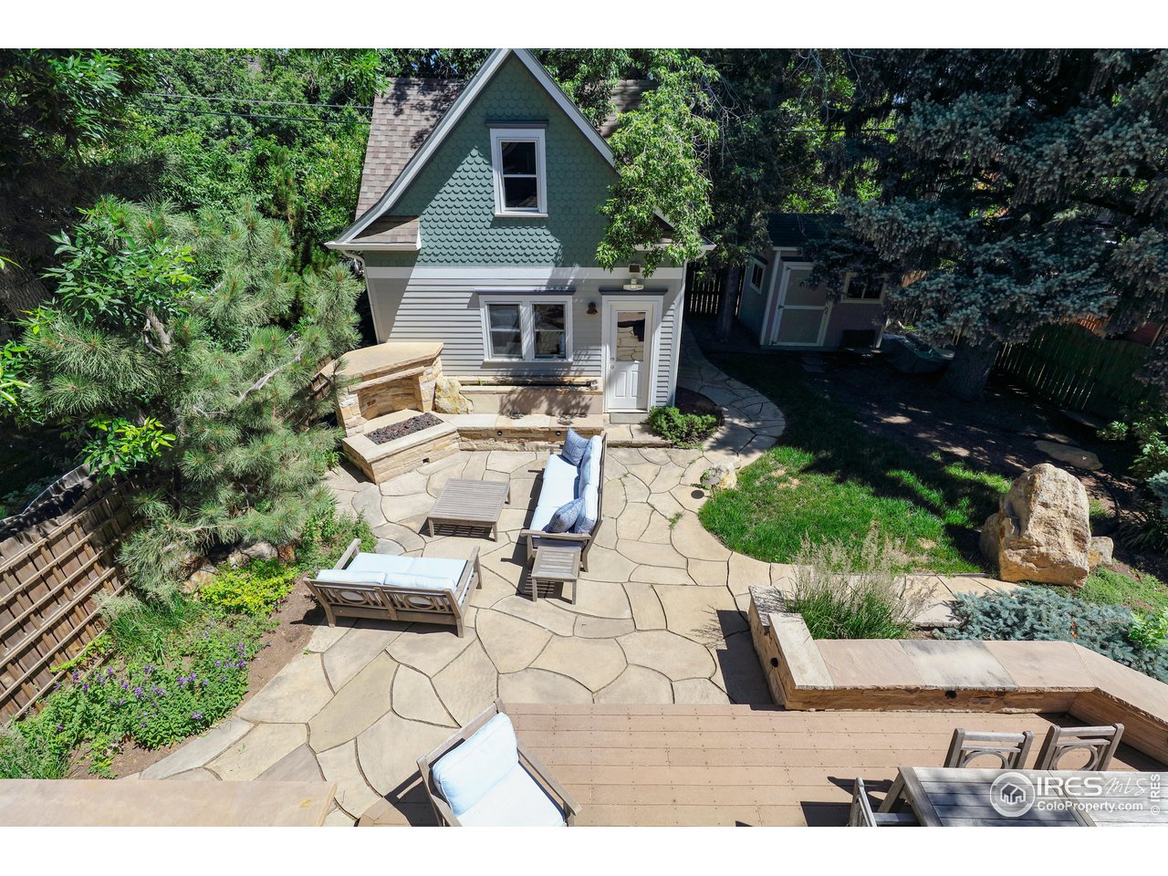 421 Highland Avenue Boulder, CO 80302 - Photo 28 of 39 a view of a patio with table and chairs and potted plants