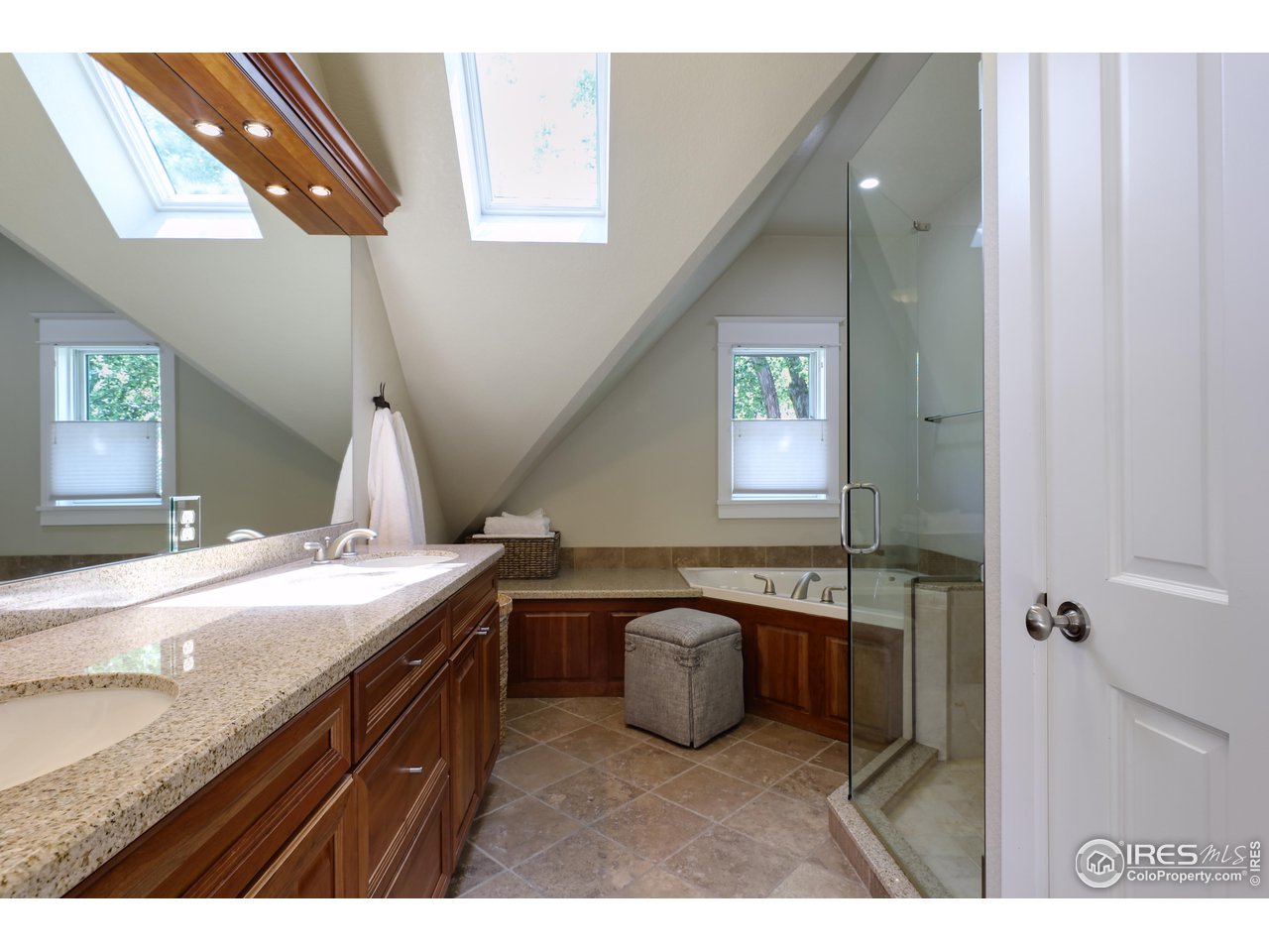 421 Highland Avenue Boulder, CO 80302 - Photo 30 of 39 a bathroom with a sink and a mirror