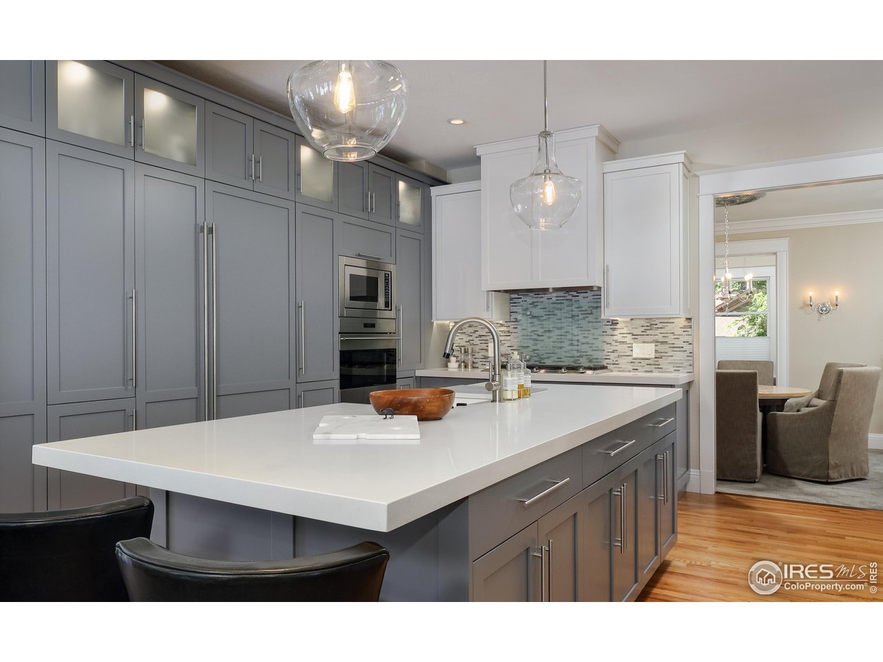 421 Highland Avenue Boulder, CO 80302 - Photo 10 of 39 a kitchen with a sink cabinets and wooden floor