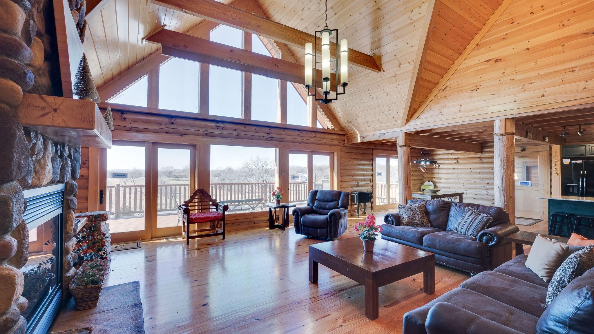 4054 Wilson Pike Franklin, TN 37067 - Photo 13 of 57 a living room with furniture or outdoor view and a large window