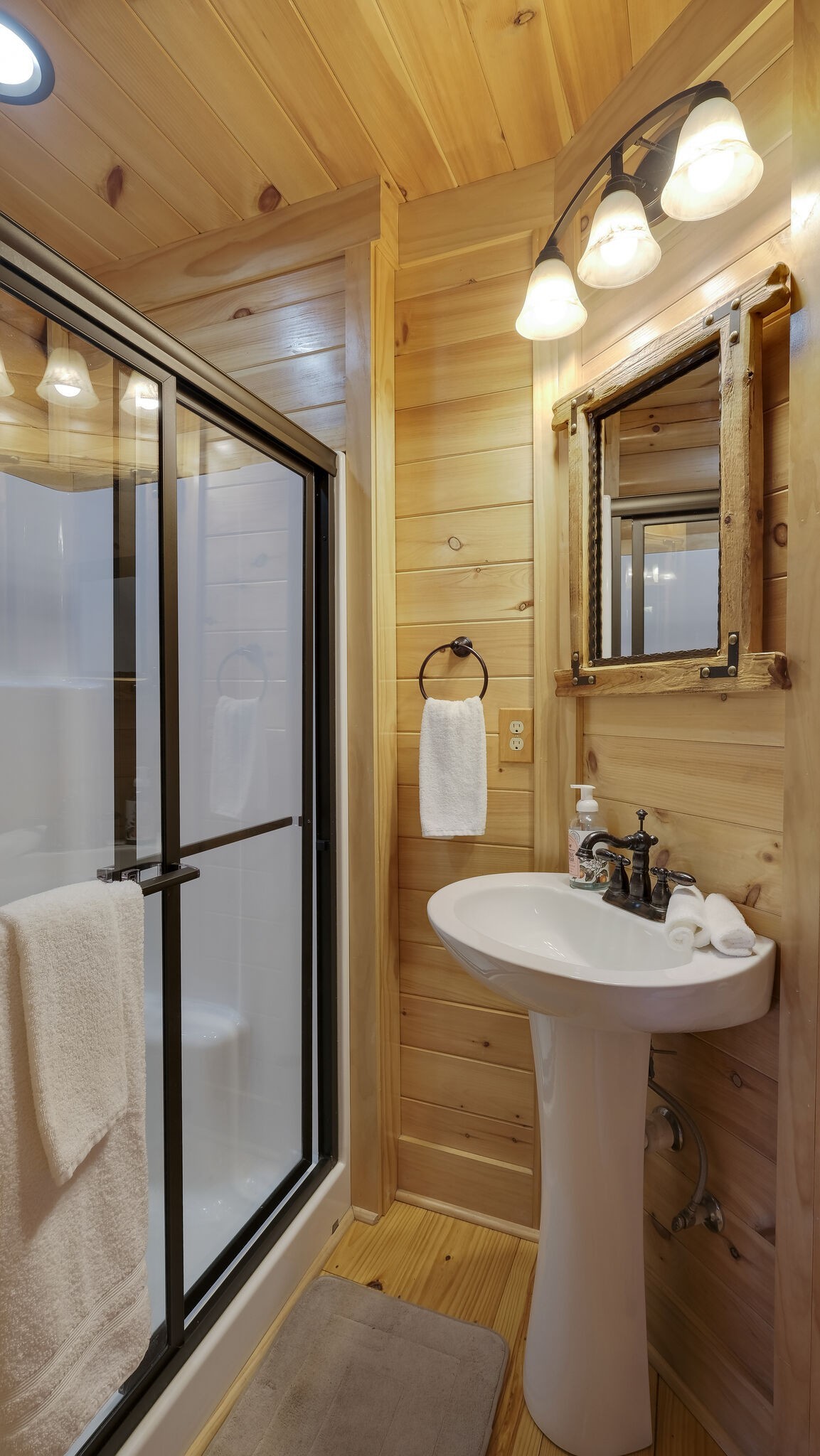 4054 Wilson Pike Franklin, TN 37067 - Photo 21 of 57 a bathroom with a sink and mirror