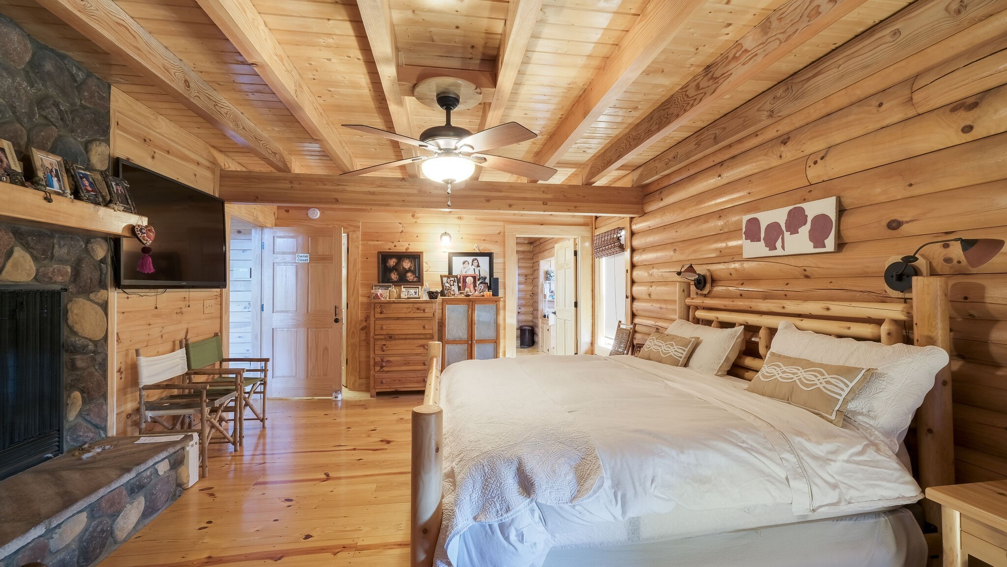 4054 Wilson Pike Franklin, TN 37067 - Photo 22 of 57 a bedroom with a bed and wooden floors