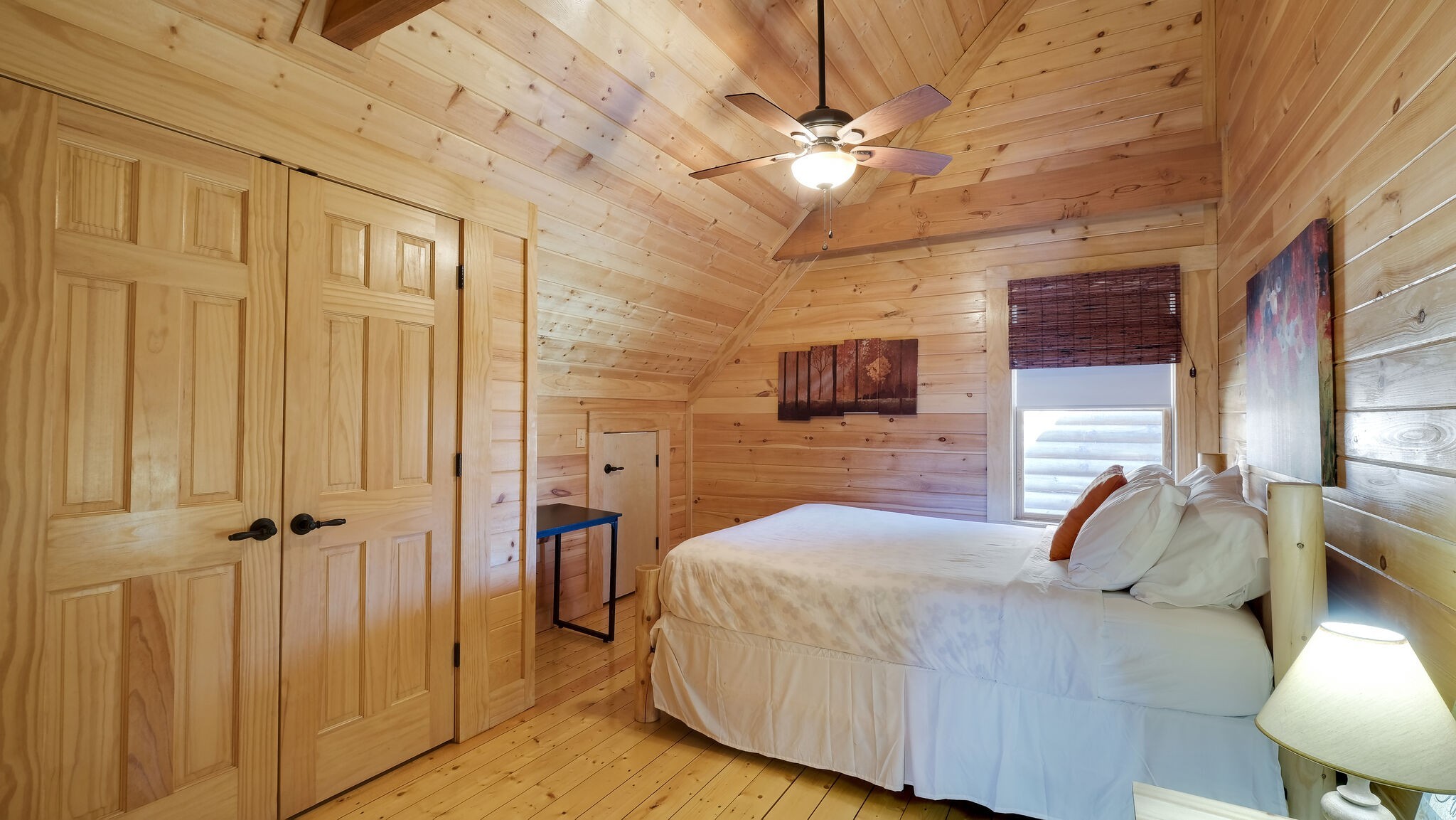 4054 Wilson Pike Franklin, TN 37067 - Photo 29 of 57 a bedroom with a bed and a chandelier