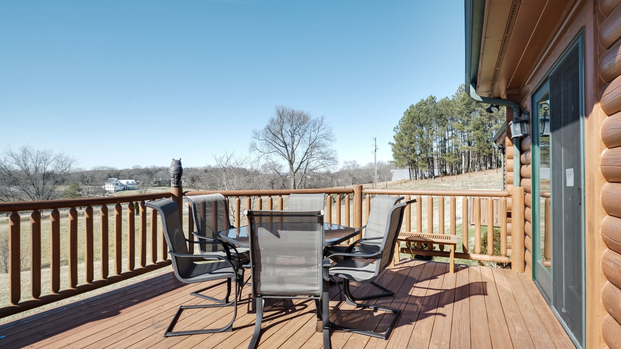 4054 Wilson Pike Franklin, TN 37067 - Photo 37 of 57 a view of a balcony with chairs and wooden floor