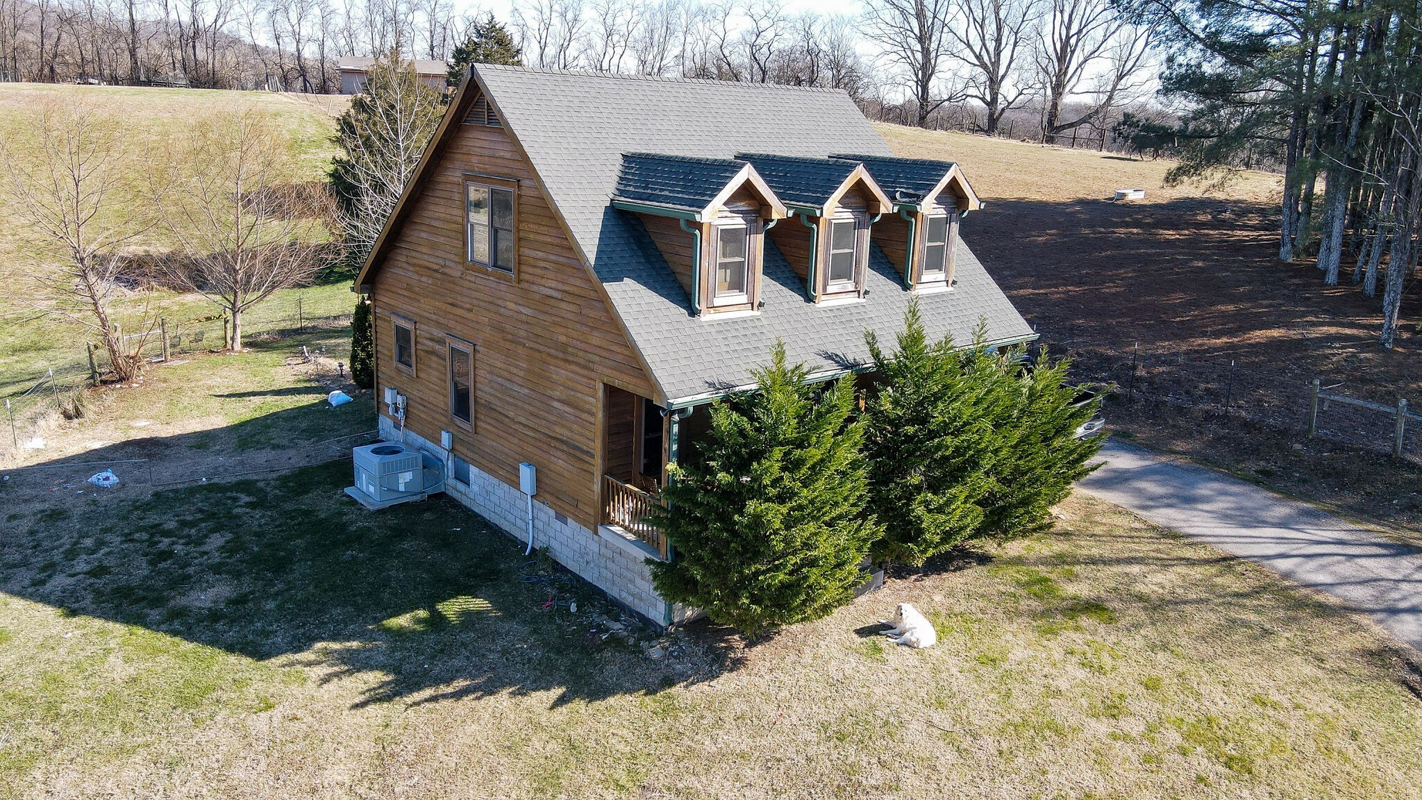 4054 Wilson Pike Franklin, TN 37067 - Photo 7 of 57 a view of an house with backyard space and garden