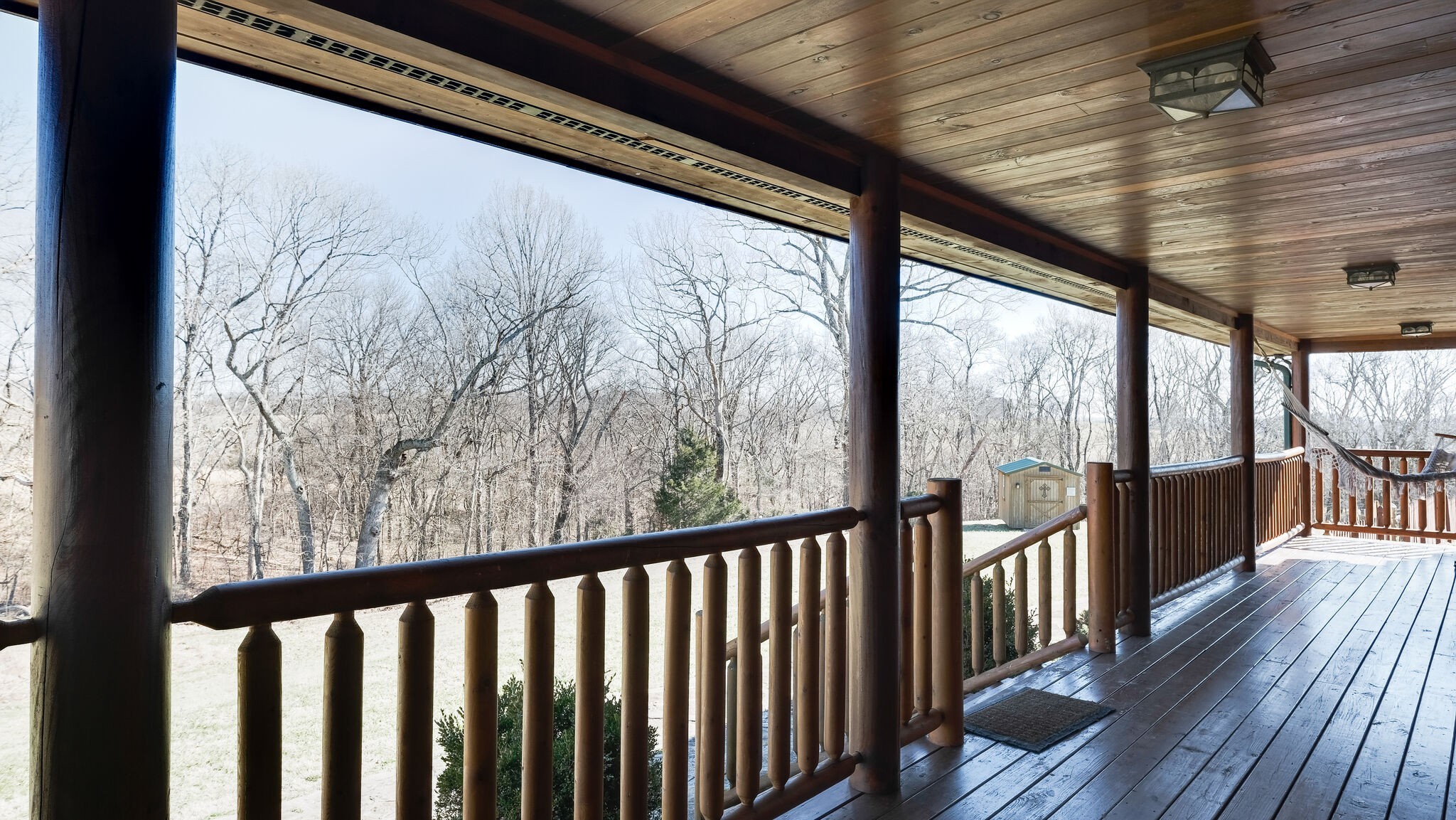 4054 Wilson Pike Franklin, TN 37067 - Photo 10 of 57 a view of a porch with wooden floor