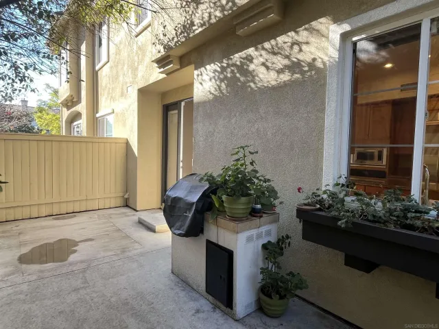 a pathway of a house and lake view