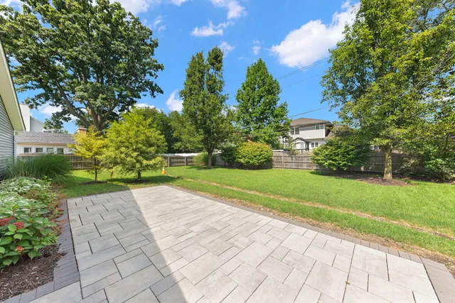 a view of backyard with green space