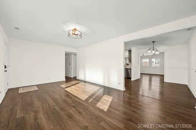 a view of a livingroom with wooden floor
