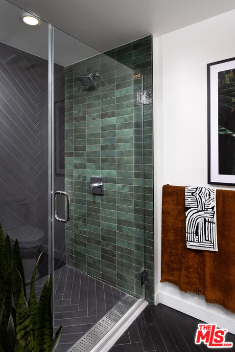 1100 Steely, Unit 1322 Irvine, CA 92614 - Photo 3 of 4 a bathroom with a shower and a sink