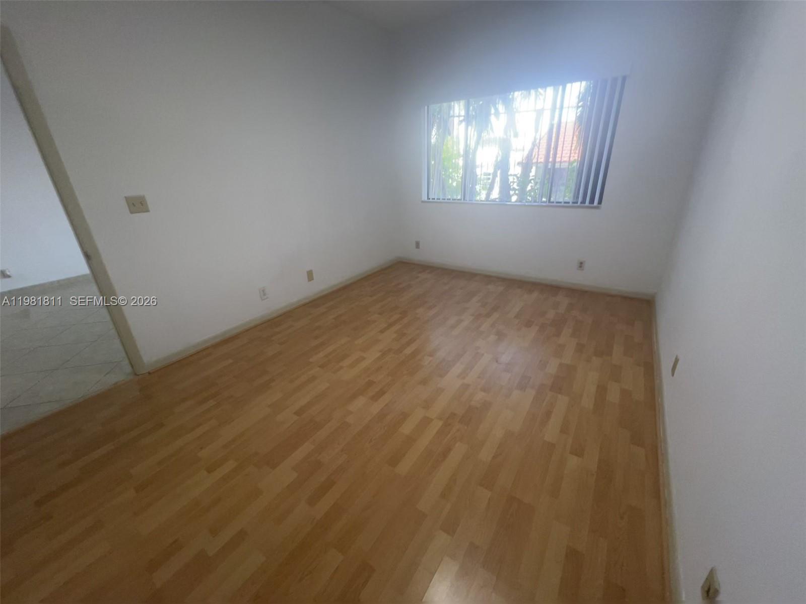 8816 Collins Avenue, Unit 105 Surfside, FL 33154 - Photo 12 of 30 a view of room with window