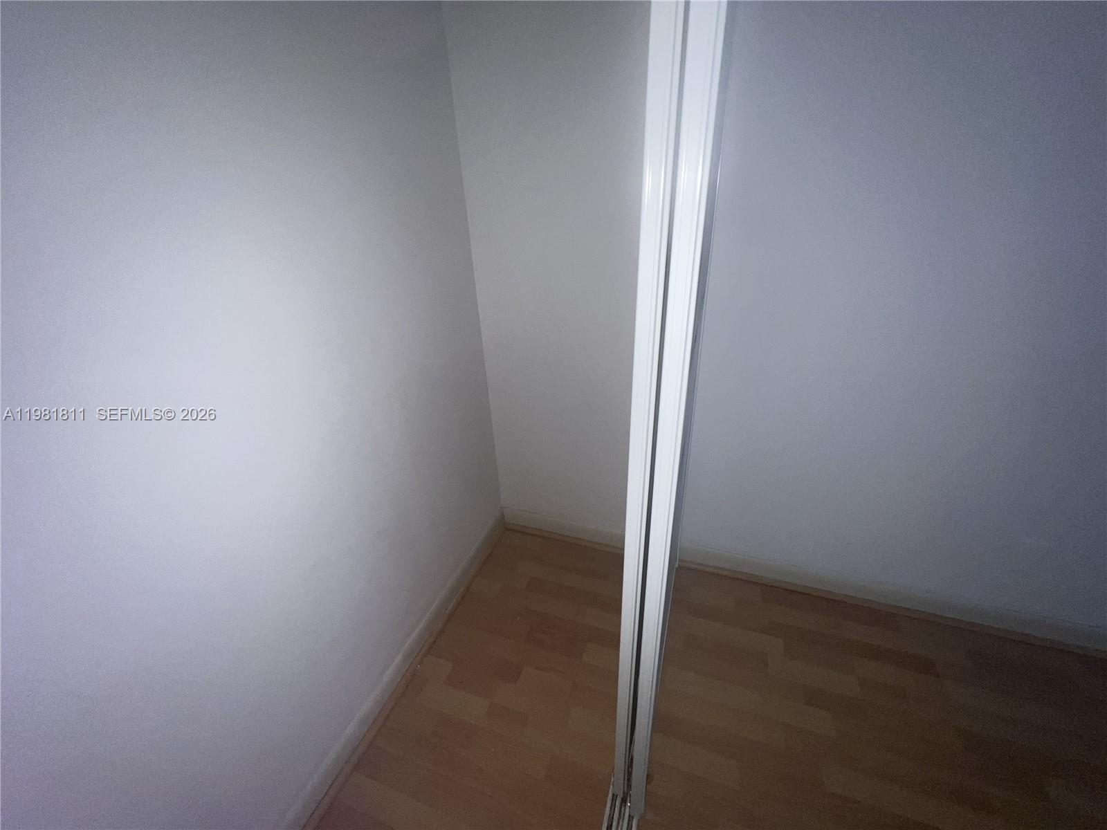 8816 Collins Avenue, Unit 105 Surfside, FL 33154 - Photo 22 of 30 a view of hallway with window