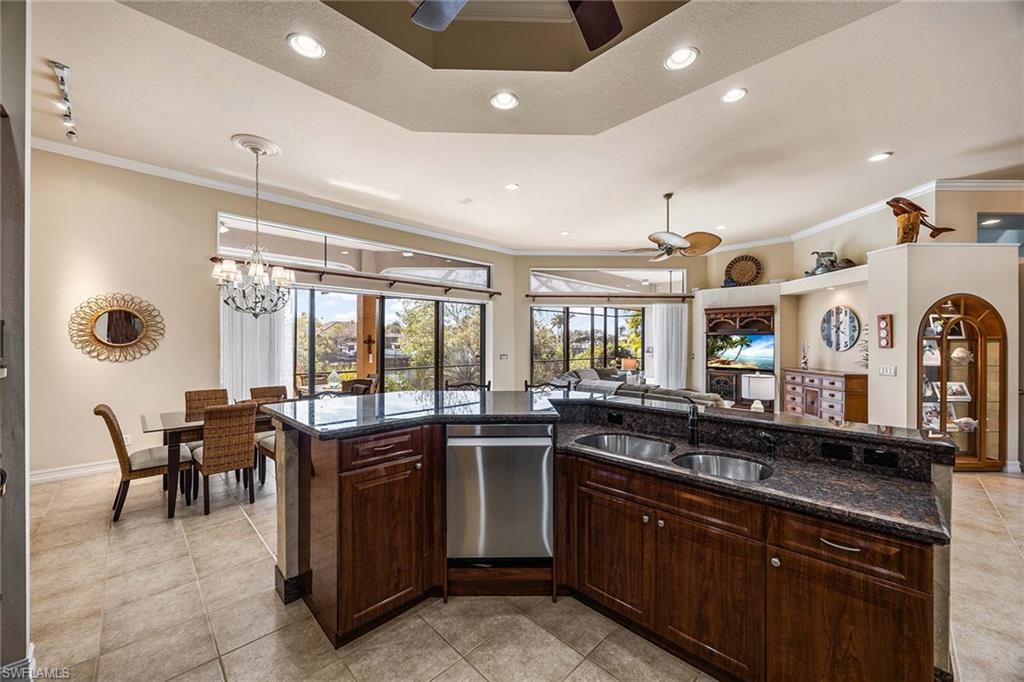 146 Windward Cay Naples, FL 34114 - Photo 11 of 33 a kitchen with lots of counter top space