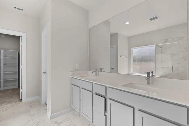 a view of an empty room and a window