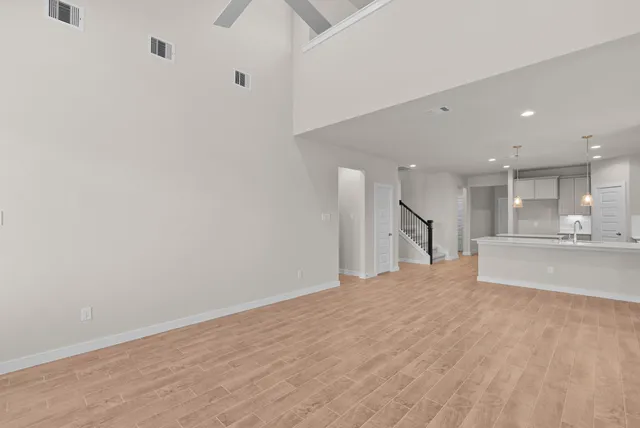 an empty room with closet area