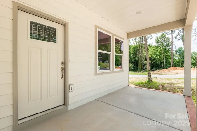 a view of a house with a big yard
