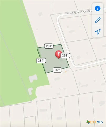 a view of a garage with washer and dryer