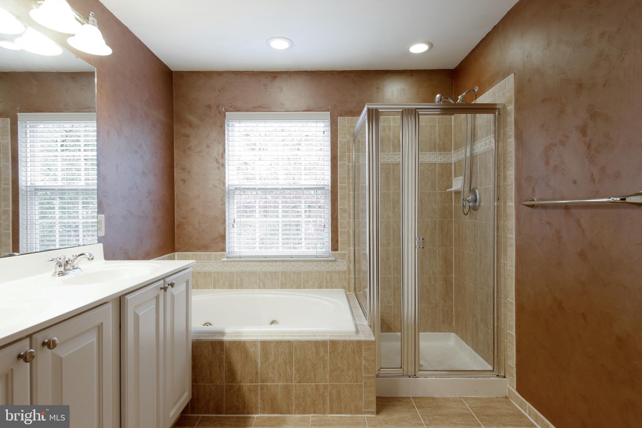 7142 Deep Falls Way, Unit 151 Elkridge, MD 21075 - Photo 20 of 43 OWNERS SUITE BATHROOM W/ JET TUB AND SHOWER