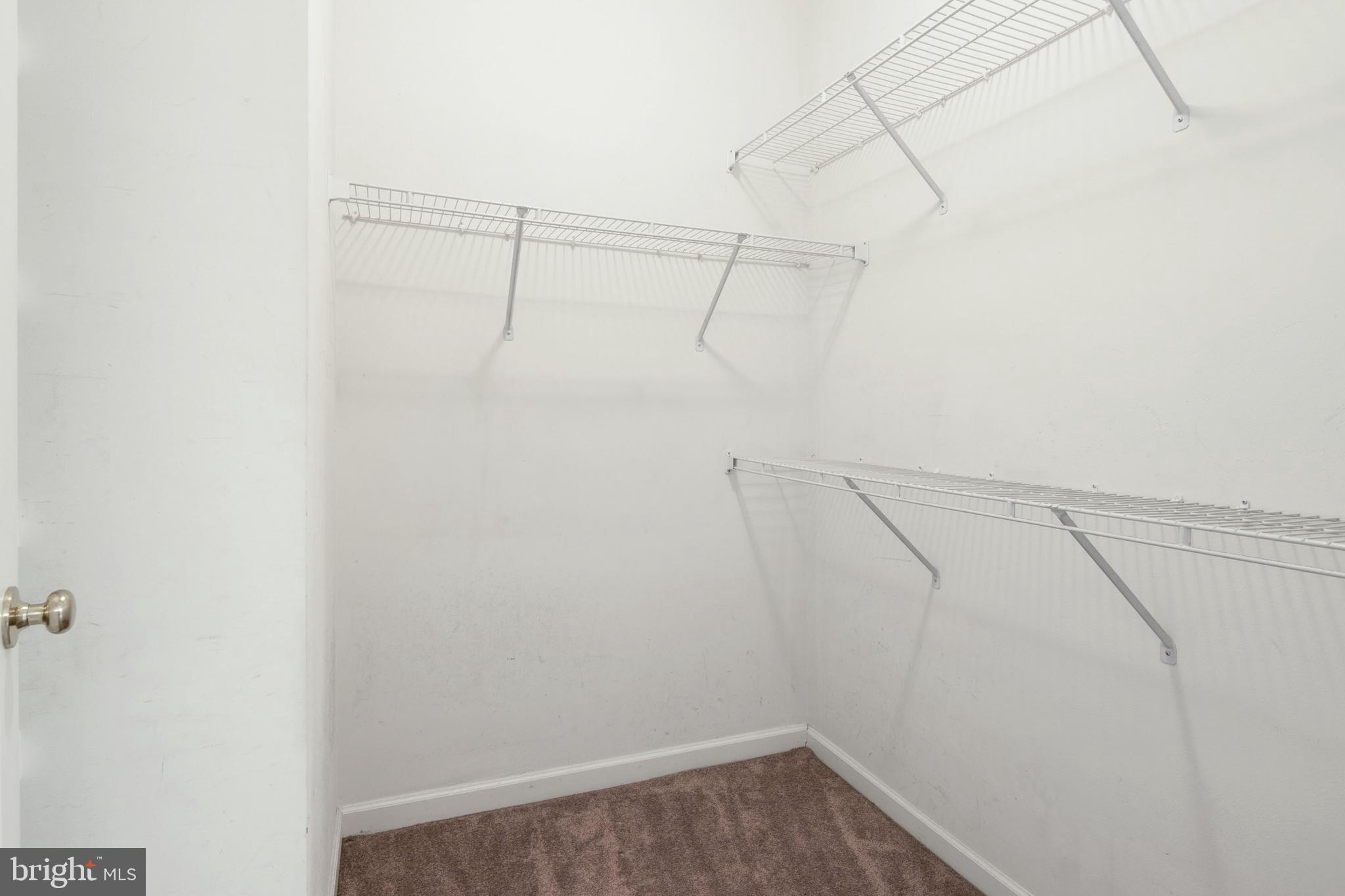 7142 Deep Falls Way, Unit 151 Elkridge, MD 21075 - Photo 21 of 43 OWNERS SUITE WALK IN CLOSET