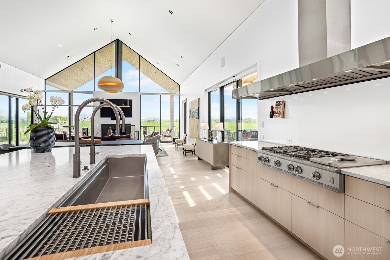 1721-j B J B George Road Walla Walla, WA 99362 - Photo 16 of 40 a kitchen with stainless steel appliances granite countertop a stove and a view of living room