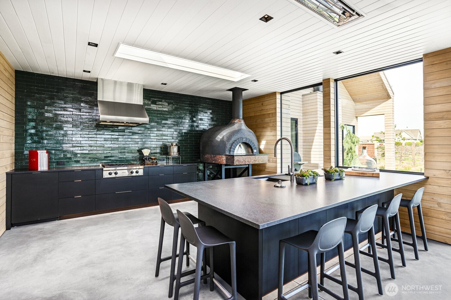1721-j B J B George Road Walla Walla, WA 99362 - Photo 19 of 40 a kitchen with a table chairs sink and cabinets