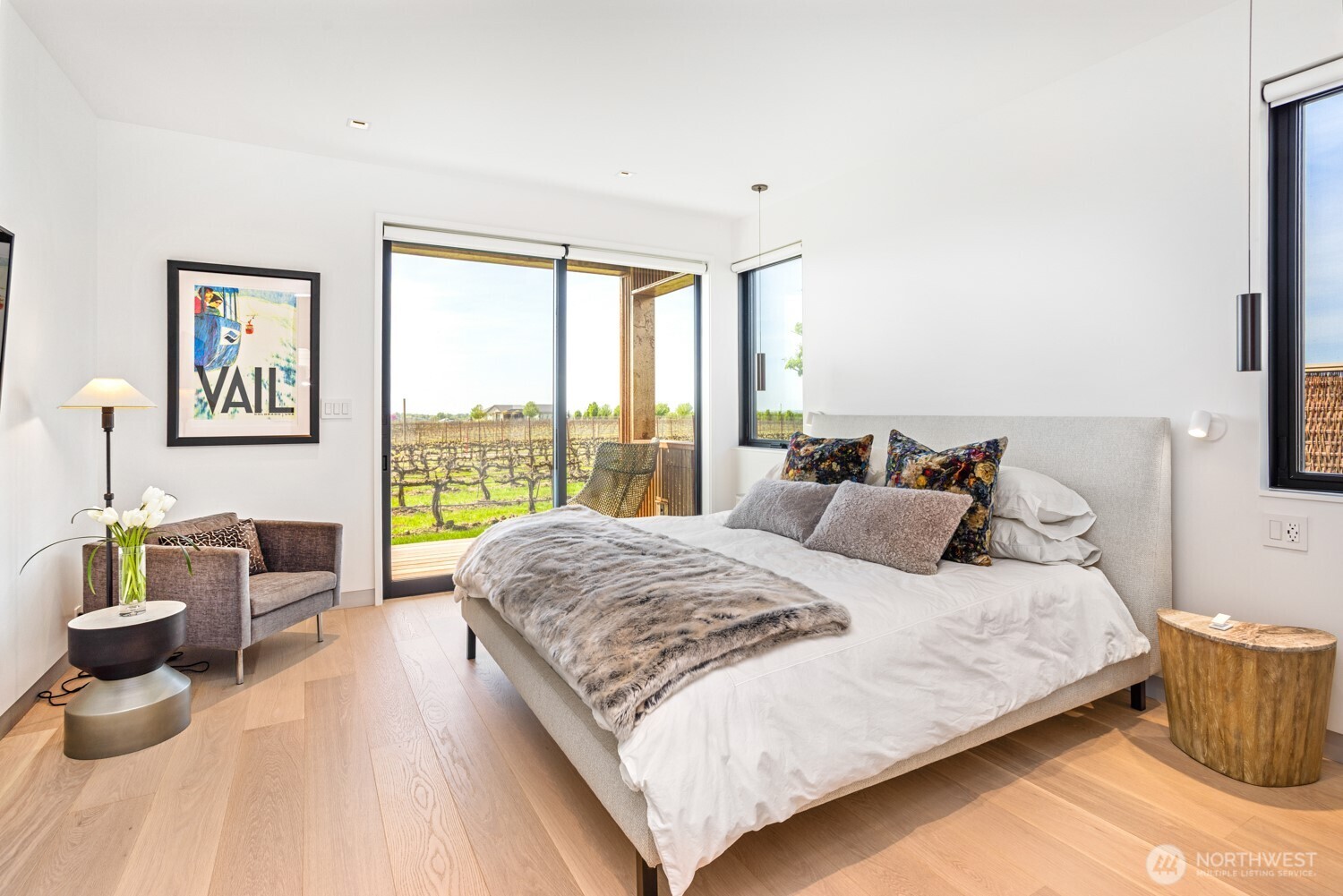 1721-j B J B George Road Walla Walla, WA 99362 - Photo 32 of 40 a bedroom with a large bed and a large window