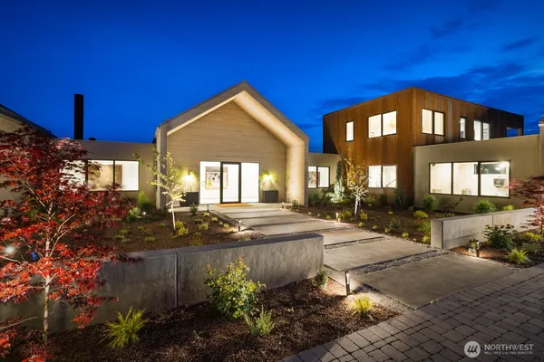 a view of swimming pool with seating area