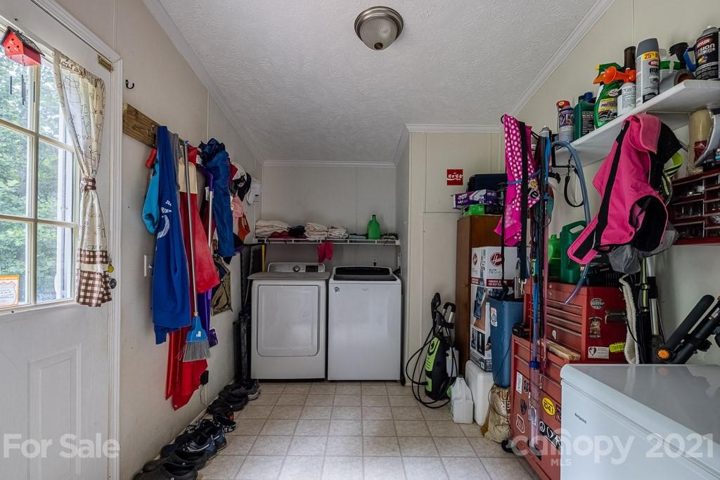 47 Integrity Mountain Otto, NC 28763 - Photo 18 of 22 a view of walk in closet with clothes