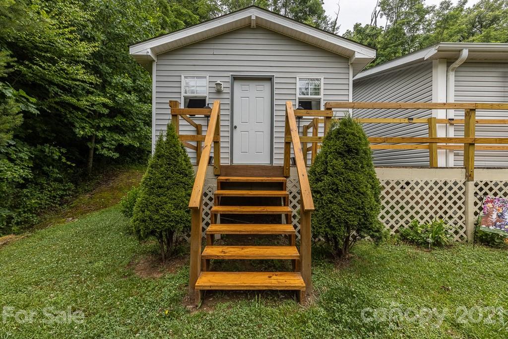 47 Integrity Mountain Otto, NC 28763 - Photo 22 of 22 a front view of a house with a yard