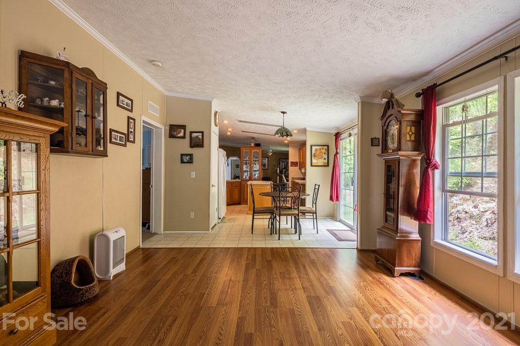 47 Integrity Mountain Otto, NC 28763 - Photo 4 of 22 a view of a livingroom with furniture and an empty room