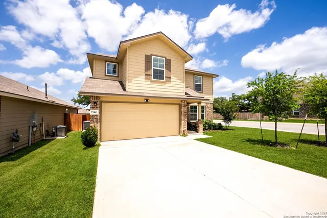 a house view with a garden space