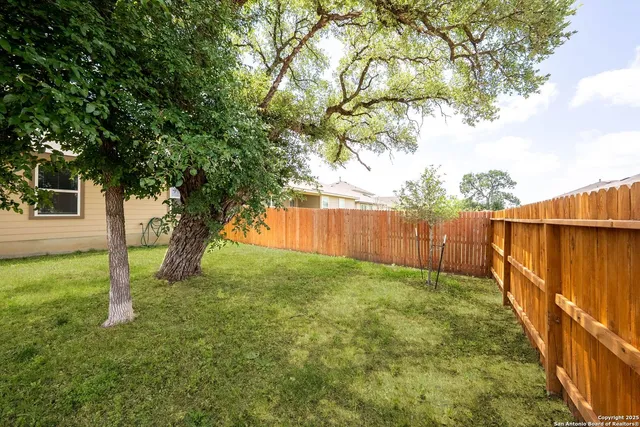 a view of outdoor space and yard