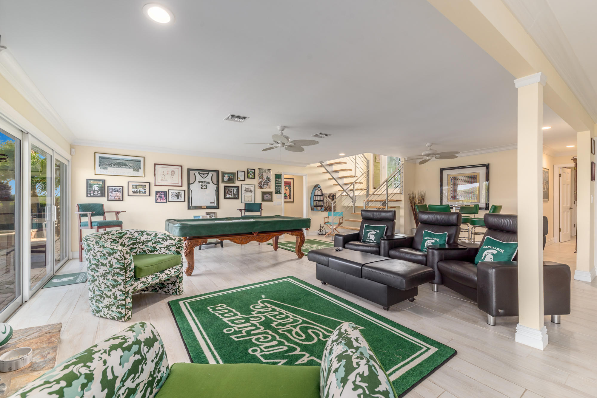 4040 Northeast Joes Point Road Stuart, FL 34996 - Photo 17 of 35 a living room with furniture and a wooden floor