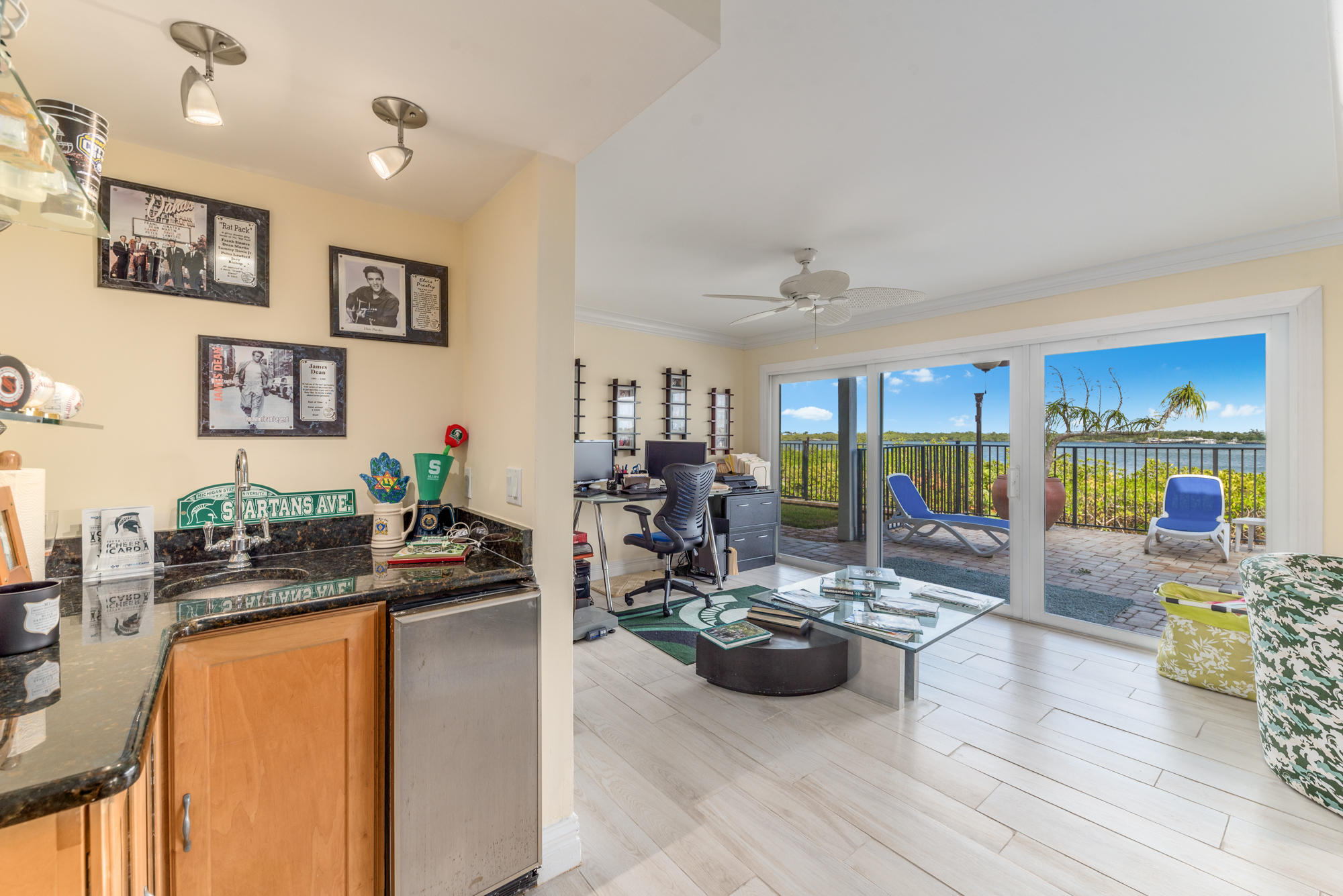 4040 Northeast Joes Point Road Stuart, FL 34996 - Photo 24 of 35 a living room with furniture and a large window