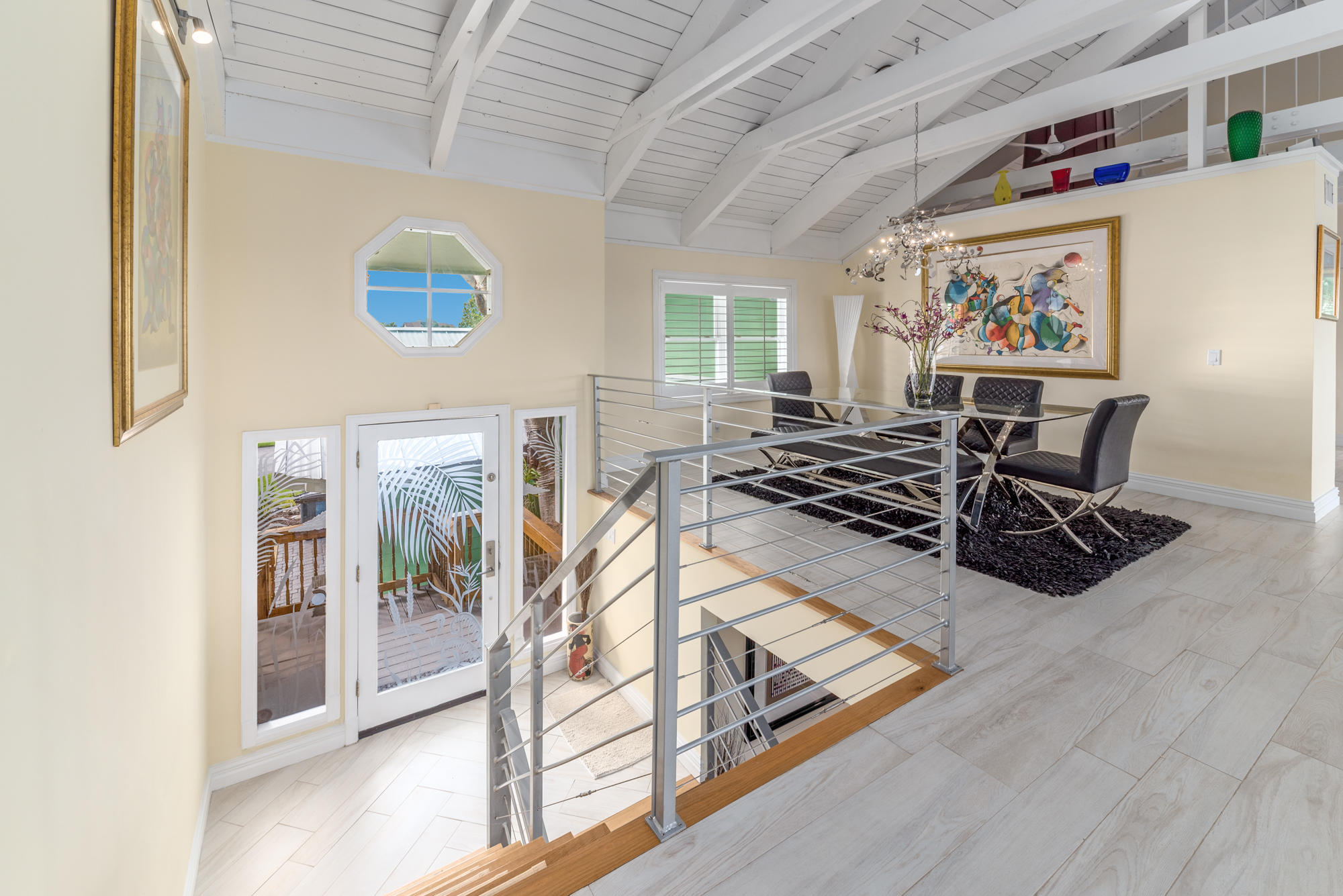 4040 Northeast Joes Point Road Stuart, FL 34996 - Photo 6 of 35 a view of a livingroom with furniture and windows