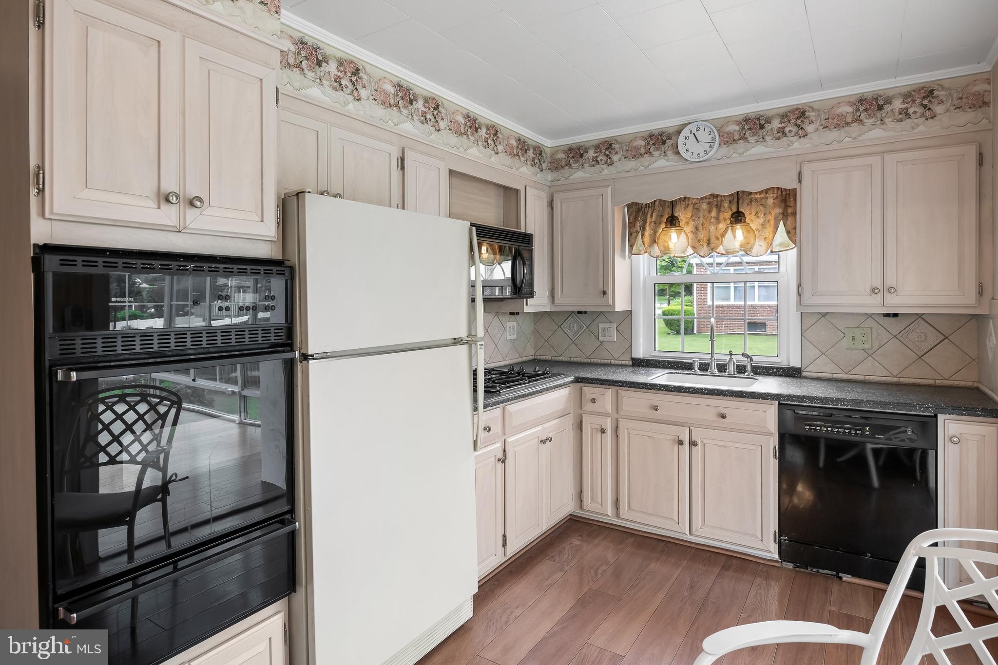 7 Colwick Road Cherry Hill, NJ 08002 - Photo 13 of 37 a kitchen with granite countertop white cabinets and white appliances