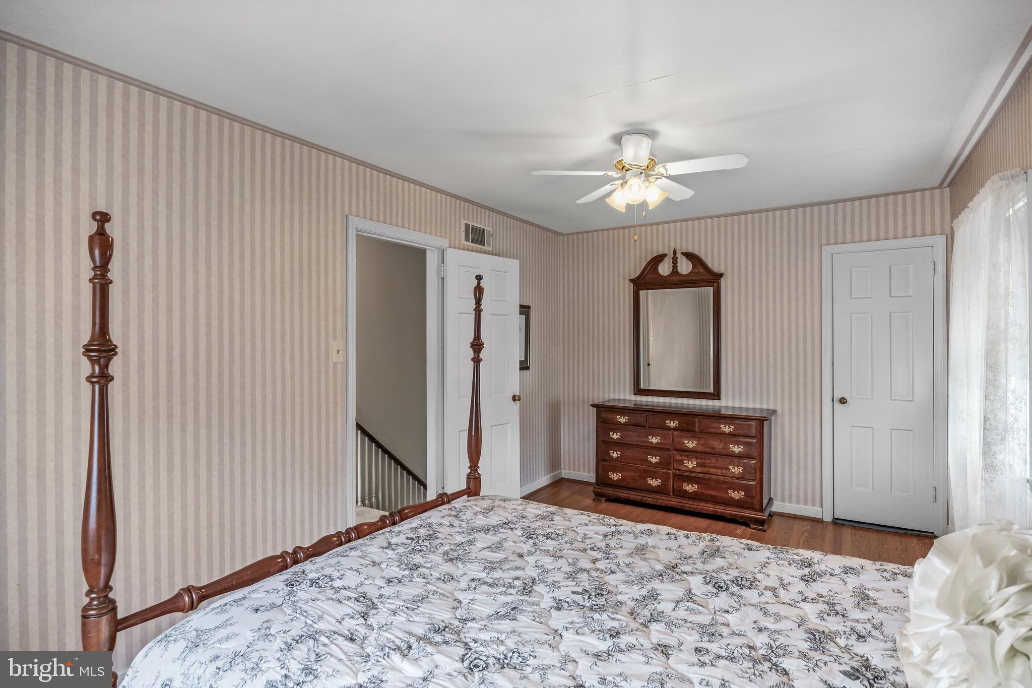 7 Colwick Road Cherry Hill, NJ 08002 - Photo 18 of 37 a bedroom with a bed dresser and a window
