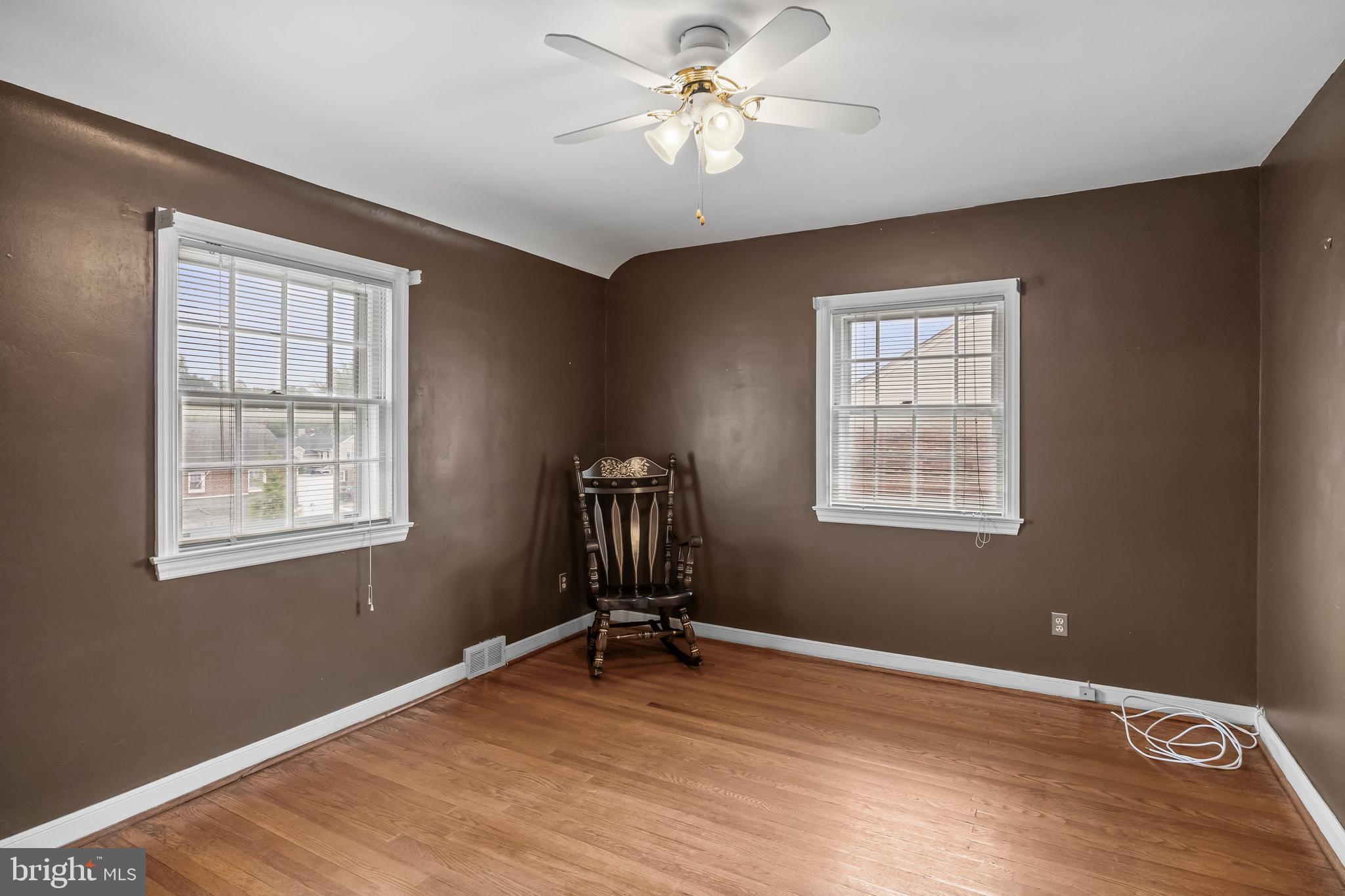 7 Colwick Road Cherry Hill, NJ 08002 - Photo 19 of 37 a view of a livingroom with a window and wooden floor
