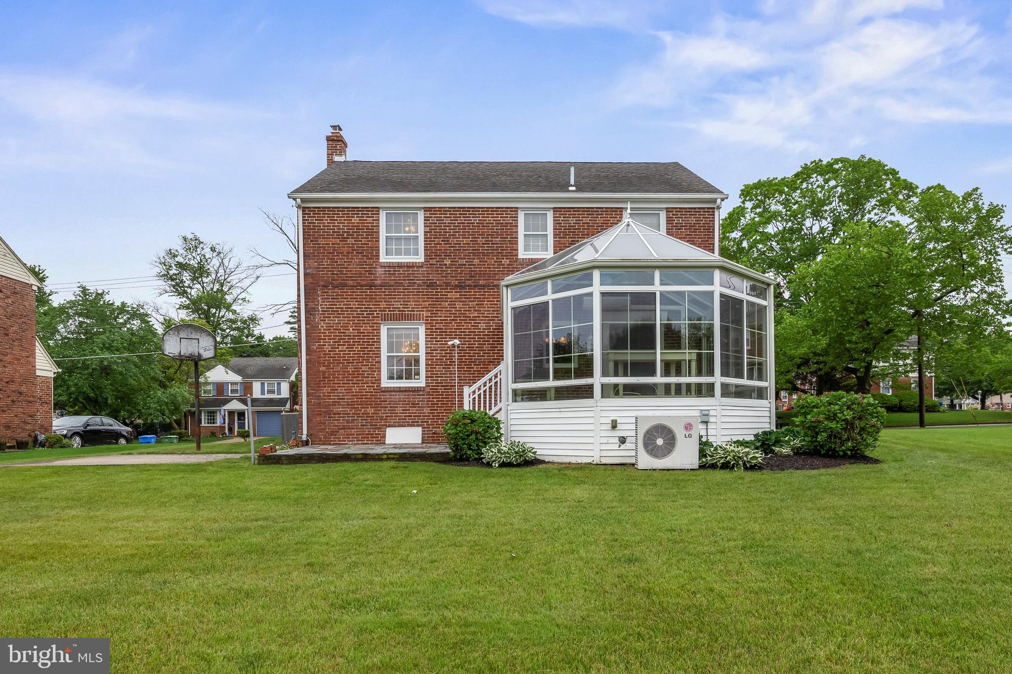 7 Colwick Road Cherry Hill, NJ 08002 - Photo 24 of 37 a front view of a house with a yard